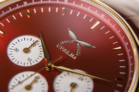 Close-up of red dial Urban Chrono Flare watch