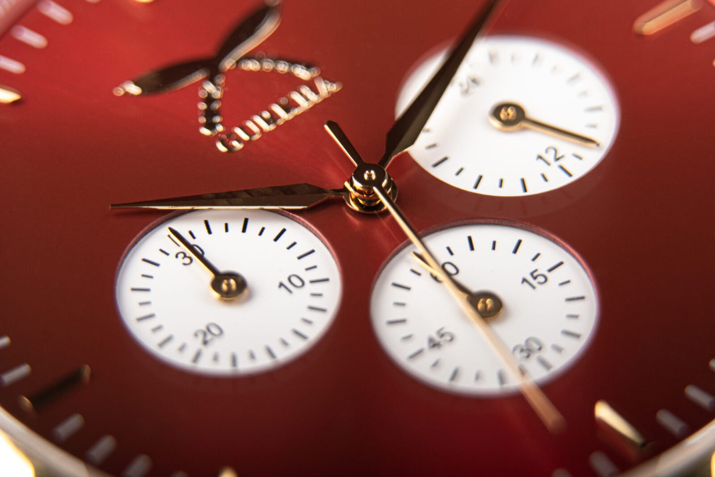 Close-up of red dial Urban Chrono Flare watch