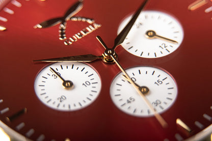 Close-up of red dial Urban Chrono Flare watch