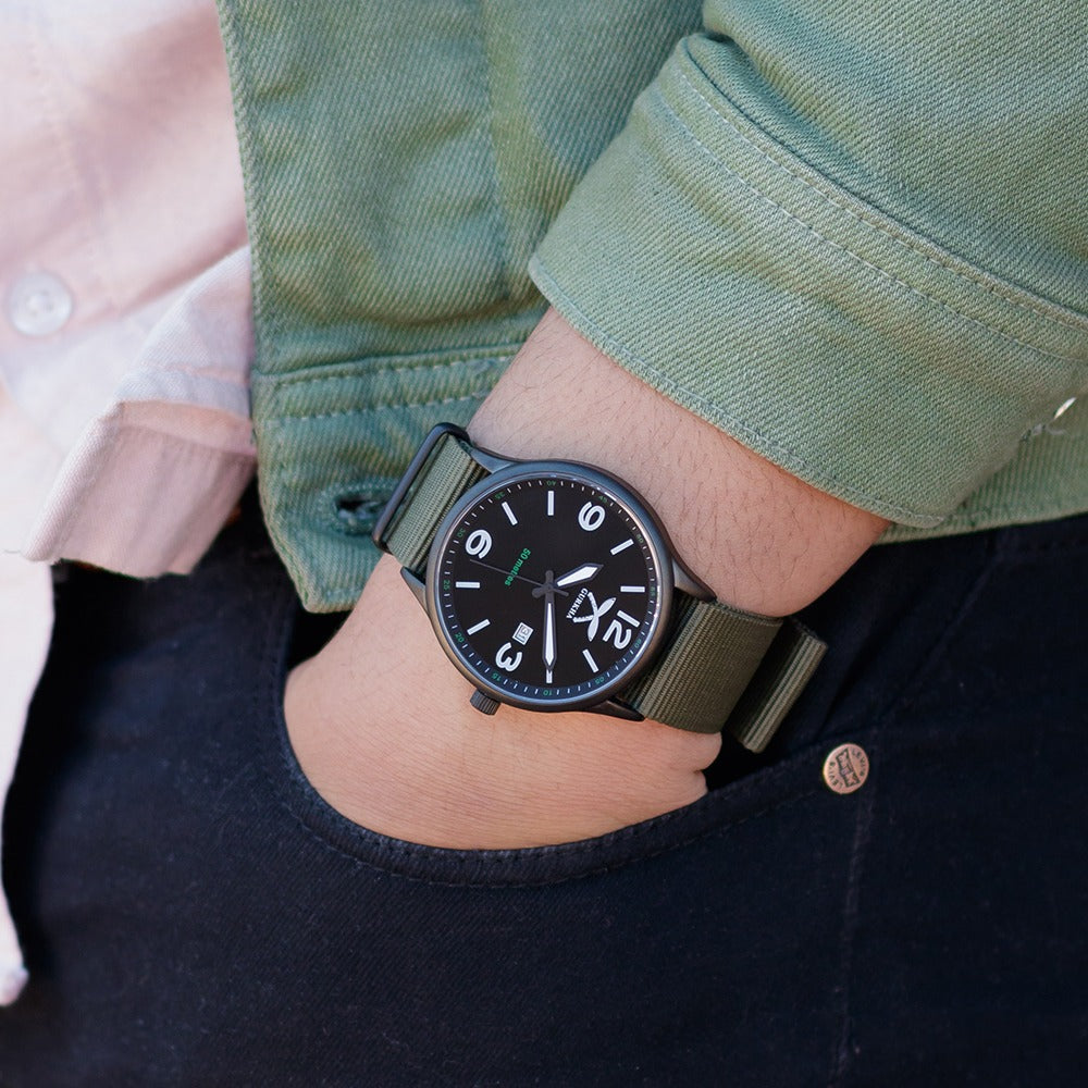 Combat Green watch with nylon strap on wrist