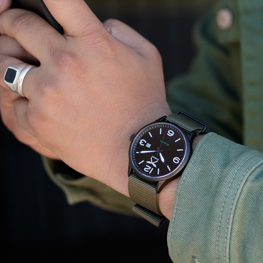 Combat Green watch with black dial and nylon strap