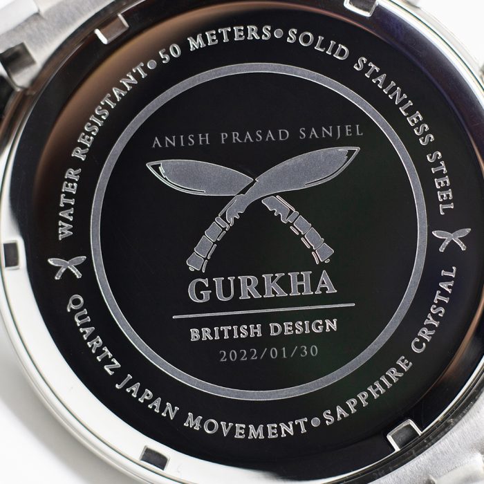 Stainless steel watch back with engraved branding
