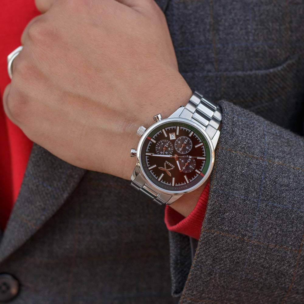 Silver stainless steel chronograph watch on wrist